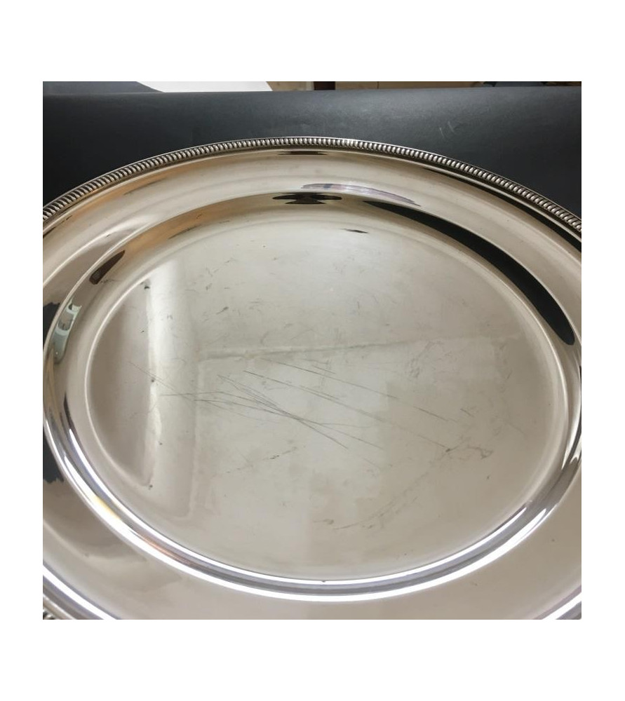 Plat rond  métal argenté vendu par Notre petite brocante.