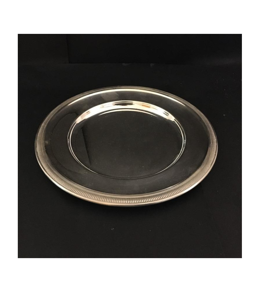 Plat rond en métal argenté vendu par notre petite brocante