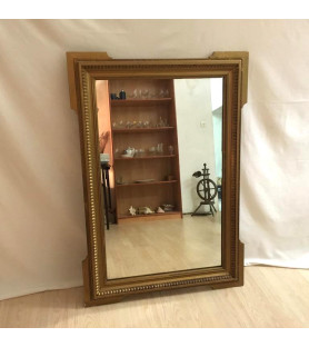 Grand miroir en stuc doré